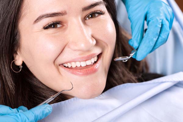 How A Dental Cleaning Can Brighten Your Smile And Help Your Oral Health